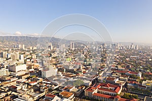 Cityscape in the morning. The streets and houses of the city of Cebu, Philippines, top view.