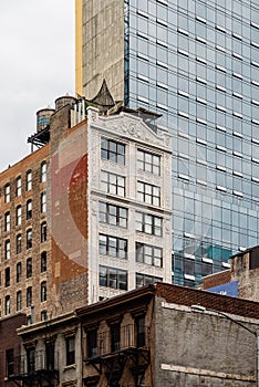 Cityscape of New York with old buildings and water towers