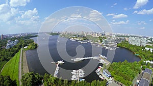 Cityscape with numerous yachts on moorage in city photo