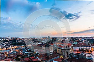 Cityscape of old city of Porto in Portugal. Lanscape with houses with tiled roofs, shot from bell tower of Church of the