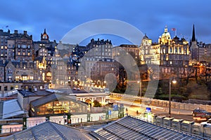 Cityscape in old town district of Edinburgh City being lit up at night in central Edinburgh, Scotland, UK