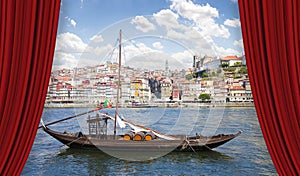 Cityscape of Oporto - Portugal with the traditional old portuguese wooden boats called barcos rabelos photo