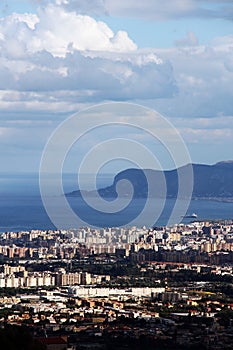 Cityscape of palermo with the gulf, dramatic sky