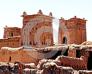 Cityscape,palm, red sand romantic safari old buldings in desert in Morocco, in the desert, in Africa