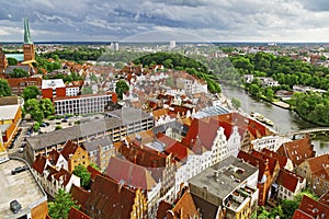 Cityscape. Panorama of German city of Lubeck. Colored roofs of houses