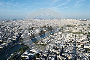 Cityscape - Paris France seen from above on a sunny day, with River Seine