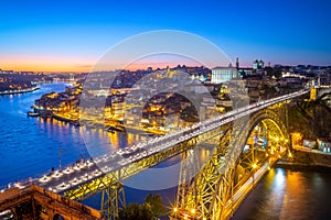 Cityscape of porto in portugal with luiz I bridge photo