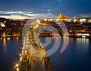 Cityscape of Prague with Castle and Charles Bridge at night