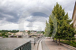 Cityscape of Prague with view of river and bridge, Czech Republic.