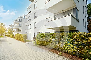 Cityscape of residential area with modern apartment buildings, new green urban landscape in the city