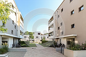 Cityscape of a residential area with modern apartment buildings, new green urban landscape in the city