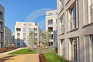 Cityscape of a residential area with modern apartment buildings, new green urban landscape in the city