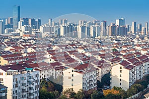 Cityscape of residential house rooftop and skyscraper