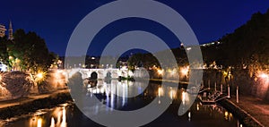 Cityscape romantic night view of Roma. Panorama with Saint Angelo castle and bridge. Famous tourist destination with Tiber. Travel