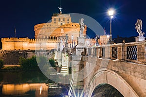 Cityscape romantic night view of Roma. Panorama with Saint Angelo castle and bridge. Famous tourist destination with Tiber. Travel