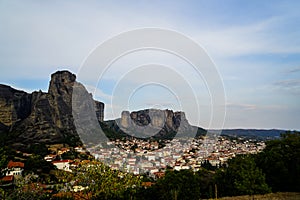 Cityscape scenic view of Kalambaka ancient town with beautiful rock formation mountain, immense natural boulders pillars and sky