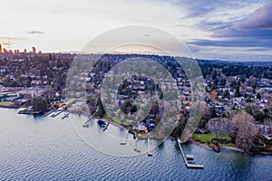 Cityscape of Seattle surrounded by the sea in the evening