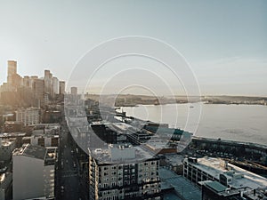 Cityscape of Seattle surrounded by the sea in the evening