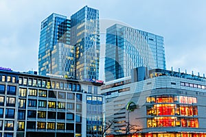 Cityscape with shopping mall and skyscrapers in Frankfurt am Main, Germany, at dusk