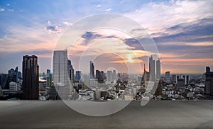 cityscape and skyline of Bangkok urban in twilight time on view from empty concrete floor