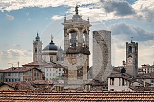 Cityscape and skyline of Bergamo old town viewed from the citadel with distinctive medieval towers