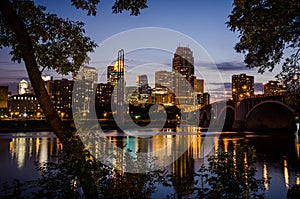 Cityscape skyline of Downtown Minneapolis Minnesota in the Twin Cities Metro area at night