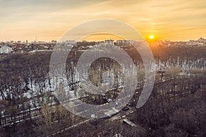 Cityscape sunset, aerial winter view at Dynamo park in Voronezh city from roofto