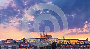 Cityscape at sunset - view of the historical district of Hradcany with the castle complex Prague Castle, Prague