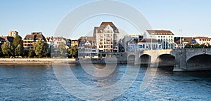 Cityscape of the Swiss city of Basel and \'Altstadt Kleinbasel\' district with bridge, Switzerland