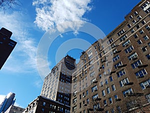Cityscape of tall buildings and sky in New York City