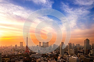 Cityscape of Tokyo, city aerial skyscraper view of office building and downtown of tokyo with sunset / sun rise background. Japan