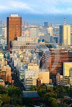 cityscape of tokyo city skyline in Aerial view with skyscraper, modern business office building with blue sky background in Tokyo