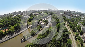 Cityscape with traffic on embankment of Yauza photo