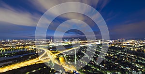 Cityscape of Vienna city at night, aerial view.