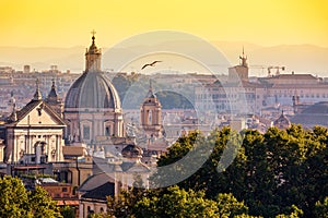 Cityscape view of historic center of Rome, Italy from the Gianicolo hill during summer sunny day sunset