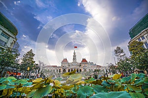 Cityscape view of HoChiMinh City People`s Committee and Nguyen Hue Walking Street , Vietnam with blue sky at sunset