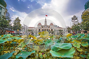 Cityscape view of HoChiMinh City People`s Committee and Nguyen Hue Walking Street , Vietnam with blue sky at sunset