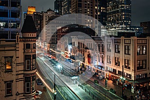 Cityscape view of Main Street at night, in Houston, Texas
