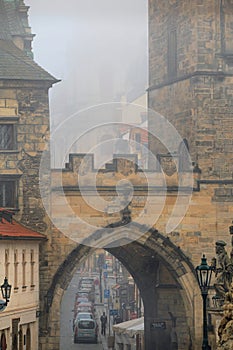 Cityscape - view of the MalÐ° Strana Bridge Tower from the Charles Bridge in the early morning, Prague