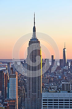 Cityscape view of Manhattan with Empire State Building at sunset