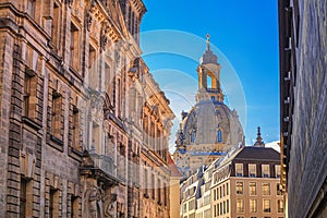 Cityscape - view of the old street of Dresden against the backdrop of the Dresden Frauenkirche