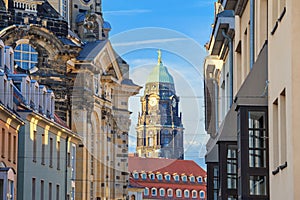 Cityscape - view of the old street of Dresden against the backdrop of the Dresden Town Hall or the City Council of Dresden