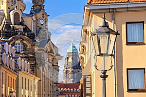 Cityscape - view of the old street of Dresden with the Dresden Frauenkirche and the Dresden Town Hall