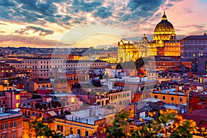 Cityscape view of Rome at sunset with St Peter Cathedral in Vatican