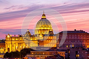 Cityscape view of Rome at sunset with St Peter Cathedral in Vatican