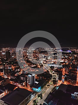 Cityscape view of the vibrant city of Bucaramanga, Colombia during the night photo