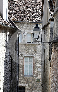 Cityscape views of medieval city Provins: Old stone house. Provins - commune in Seine-et-Marne department, Ile-de-France