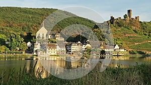 Cityscape of village Beilstein at Moselle river in Germany. Evening sun