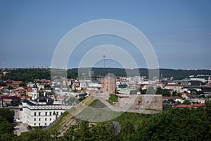 Cityscape of Vilnius displaying a view of Gediminas Tower beside buildings