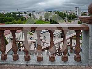 A cityscape of vitebsk, with a stone balustrade